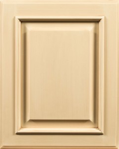 Aspen Raised Panel Door Style with Vanilla Cream Enamel and Lite Brown Brushed Shadow on Maple